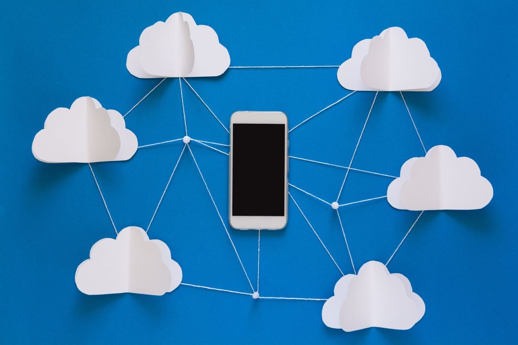 cloud services improve business productivity; phone connected to cloud