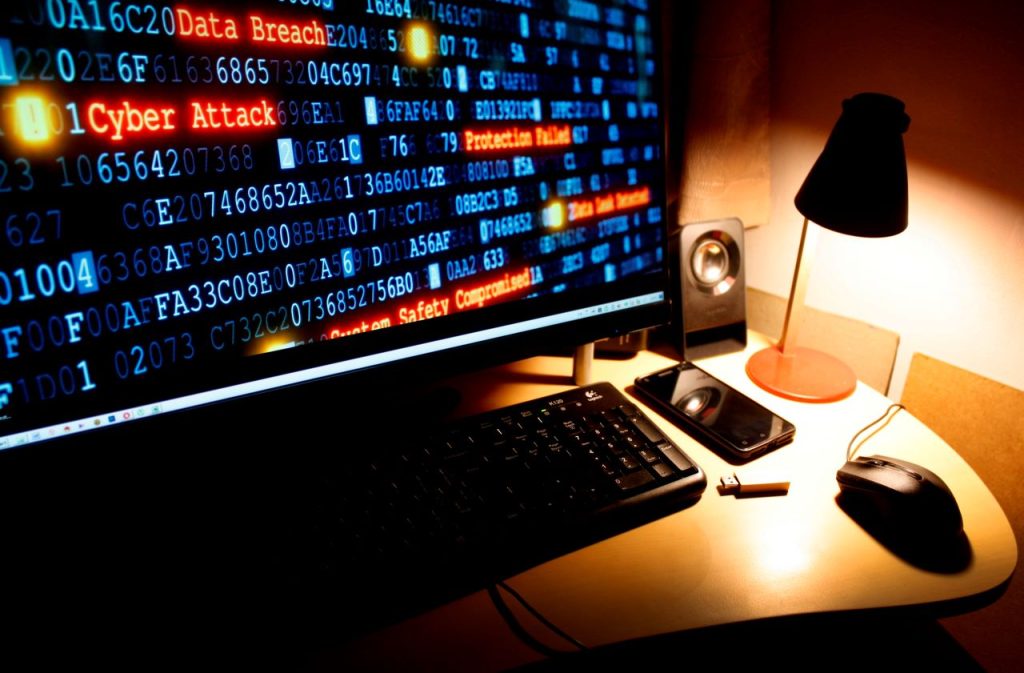 Vulnerability Assessments for E-commerce, cyber attack written in red on a computer screen
